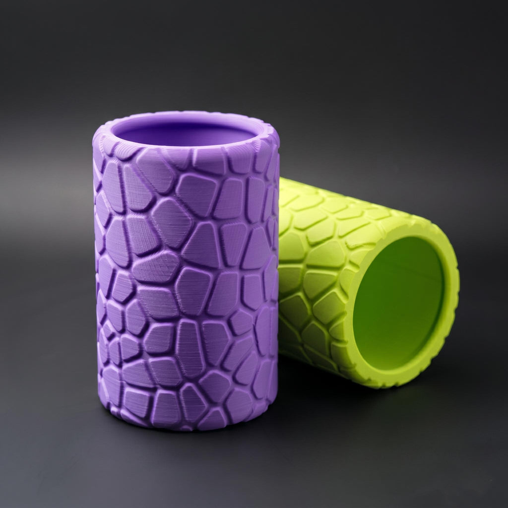 Purple pot standing in front of the lime pot lying on its side