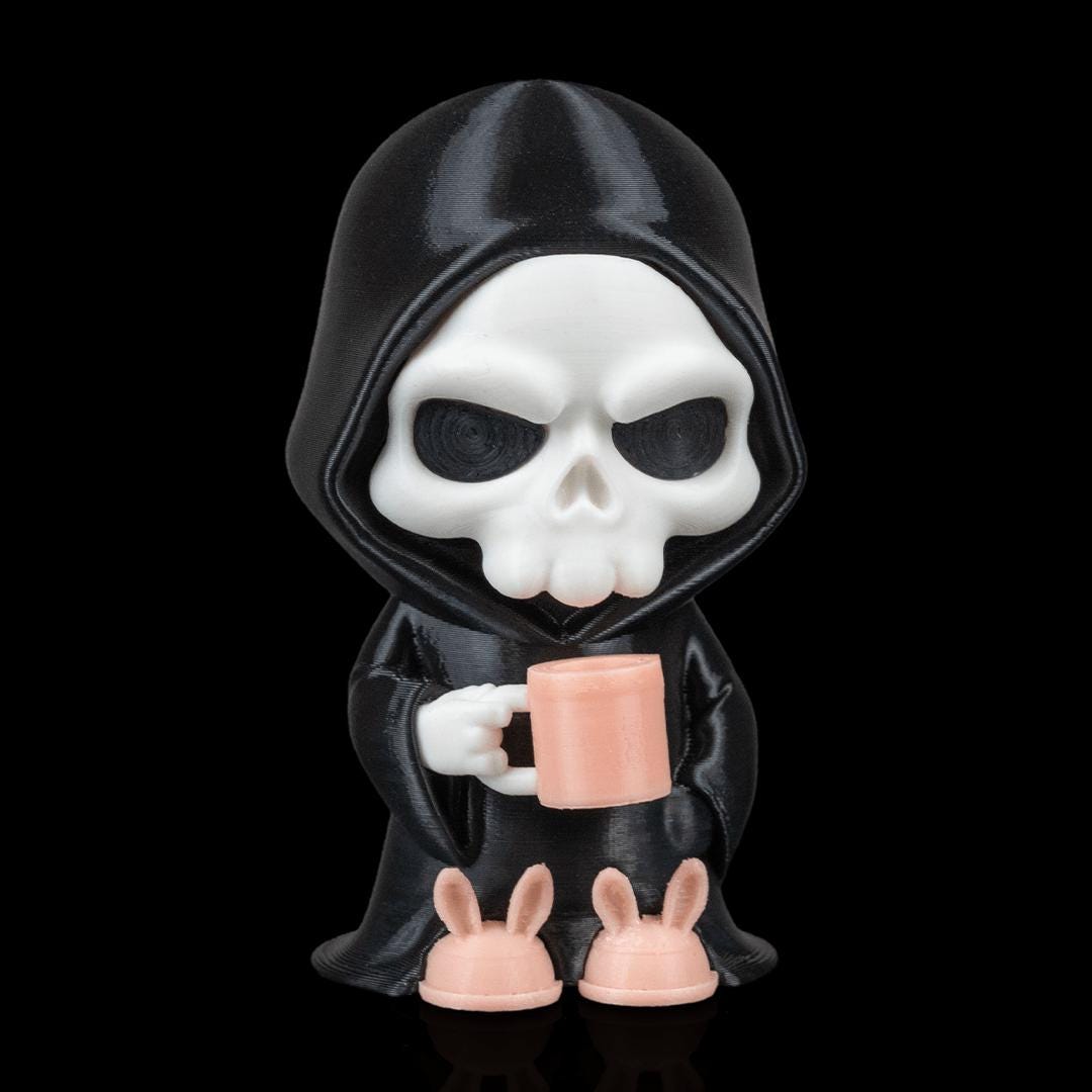 Coffin Break grim reaper figure from the front, holding a pink coffee mug, in pink bunny slippers