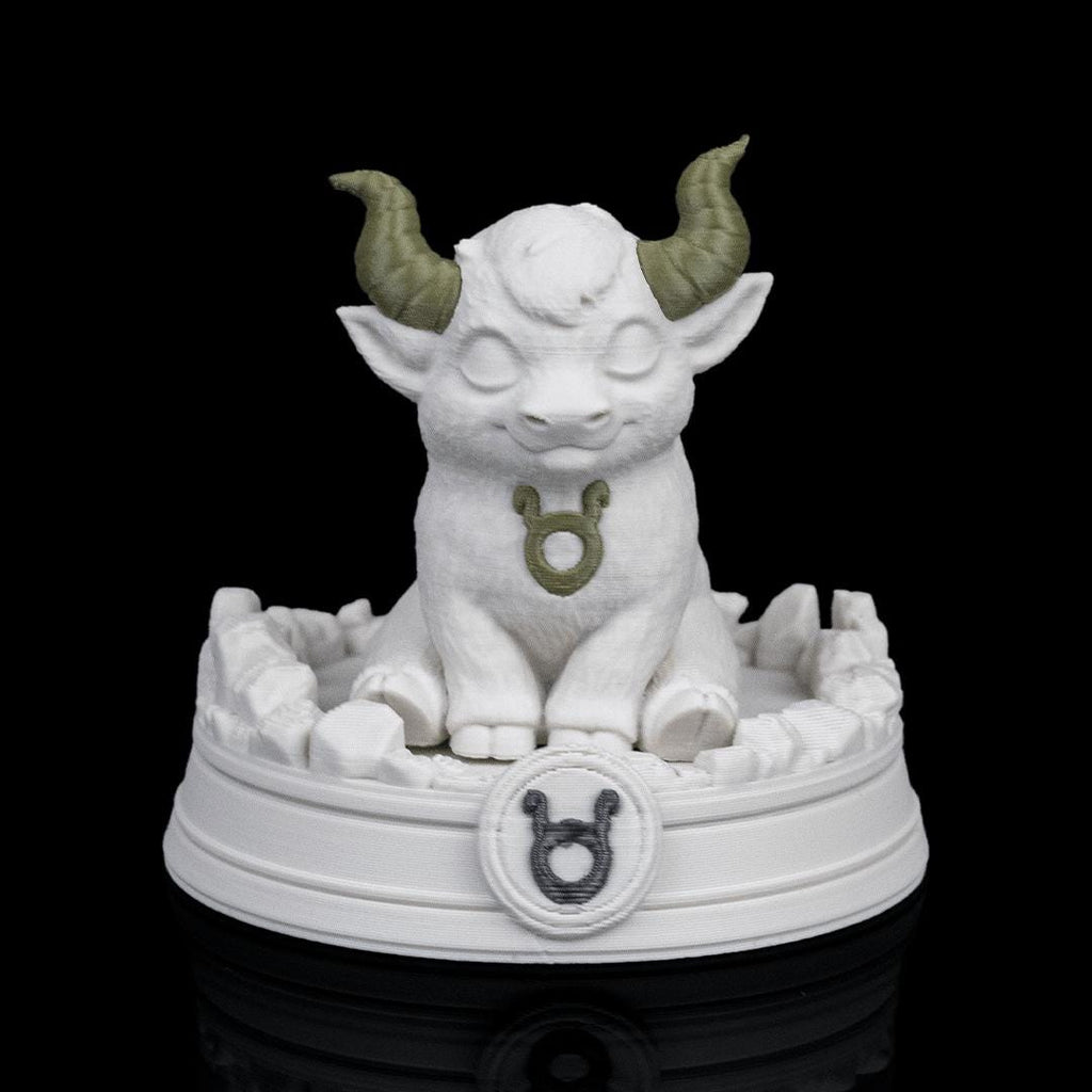 Taurus chibi bull on its base from the front, the Taurus symbol on the base