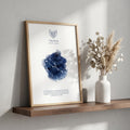Taurus zodiac constellation print in indigo watercolour, with the Taurus symbol and dates, in a wood frame on a shelf