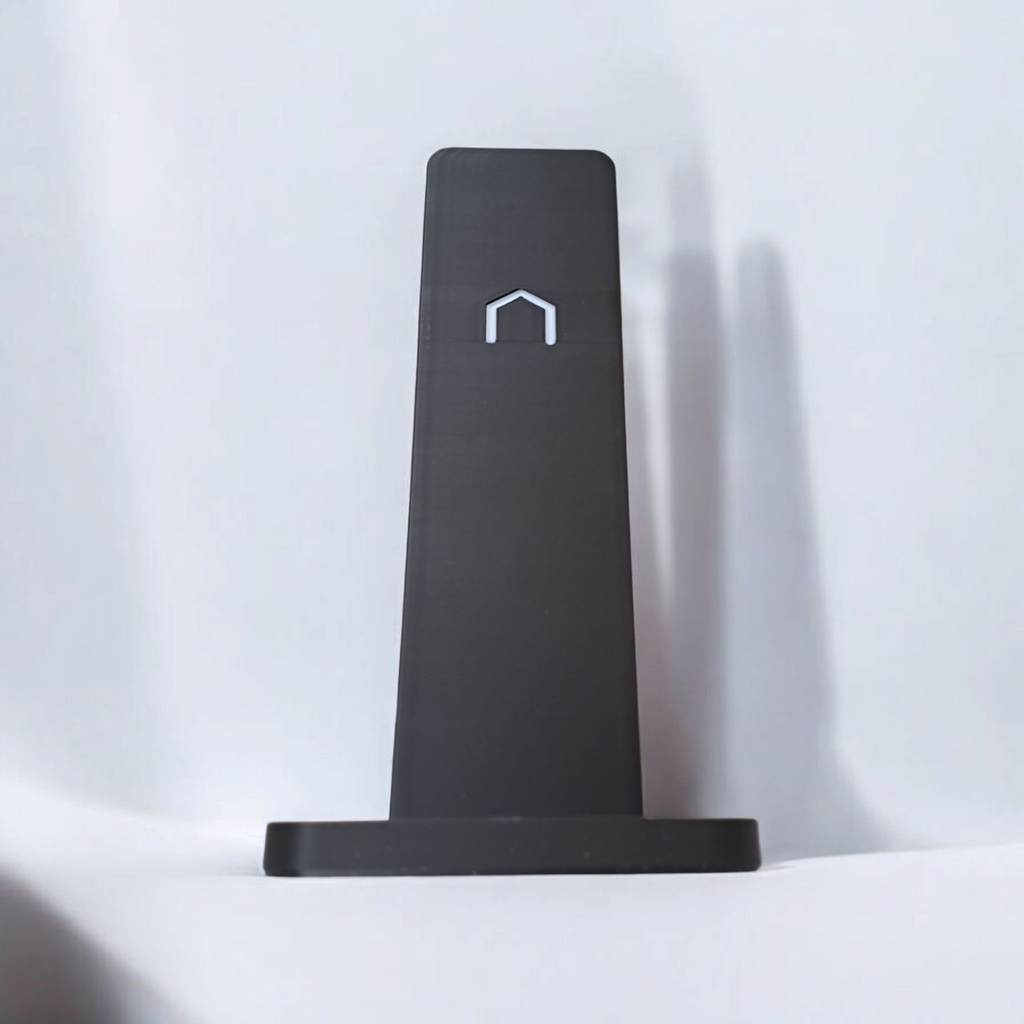 Sleek headphone stand in a modern office workspace