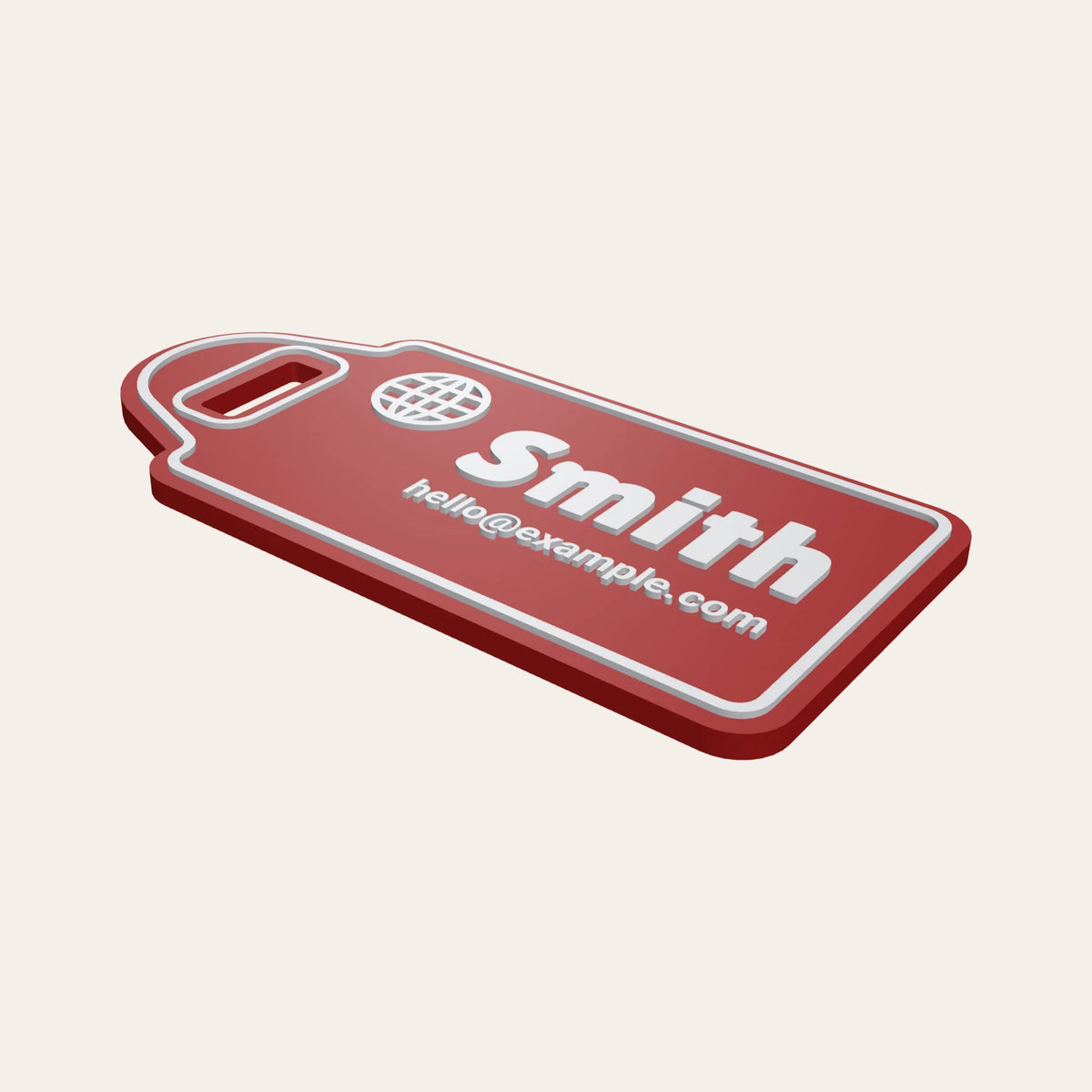 Red luggage tag with a globe icon, the name Smith and an email address