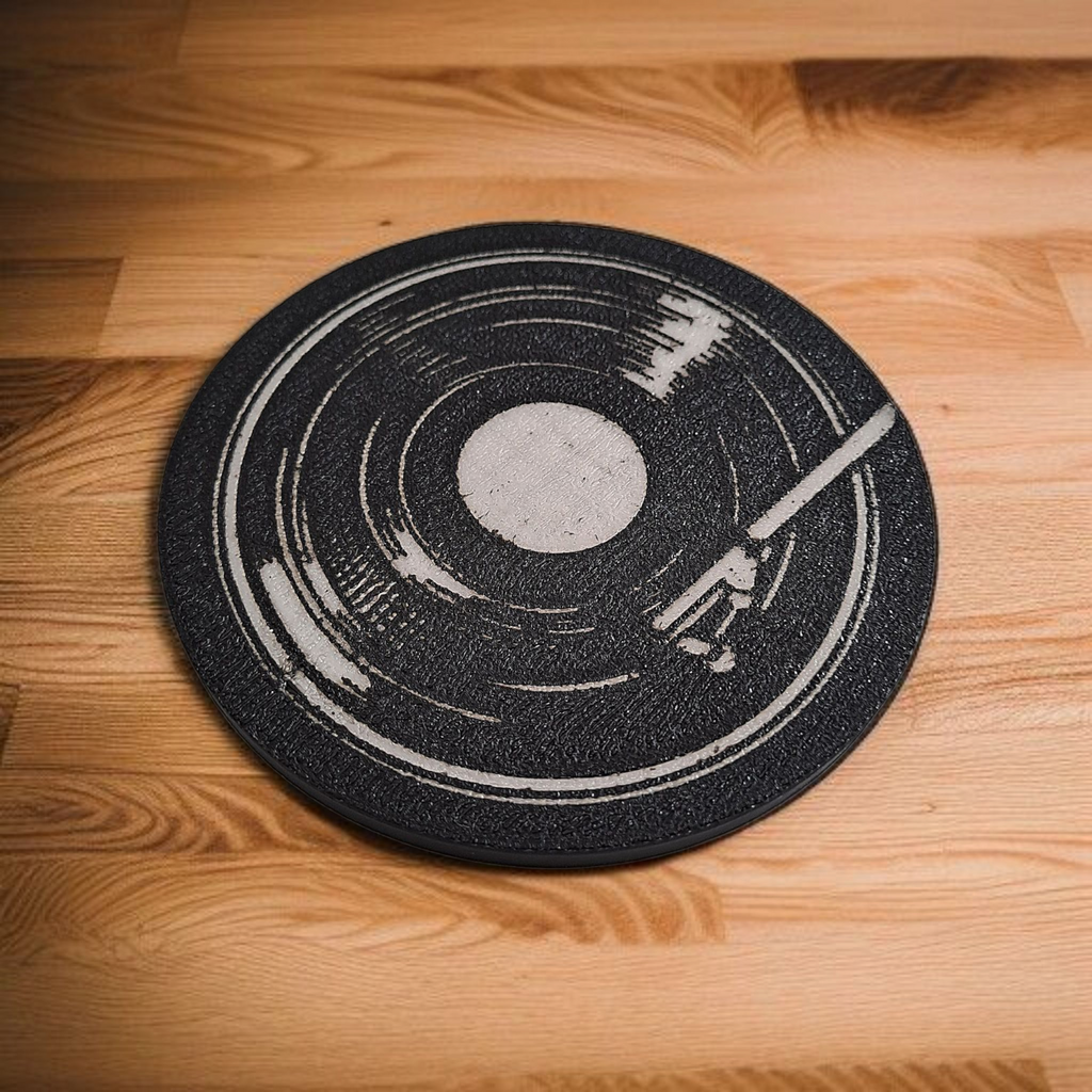 Close-up of 3D printed details on a retro vinyl coaster