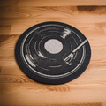 Close-up of 3D printed details on a retro vinyl coaster