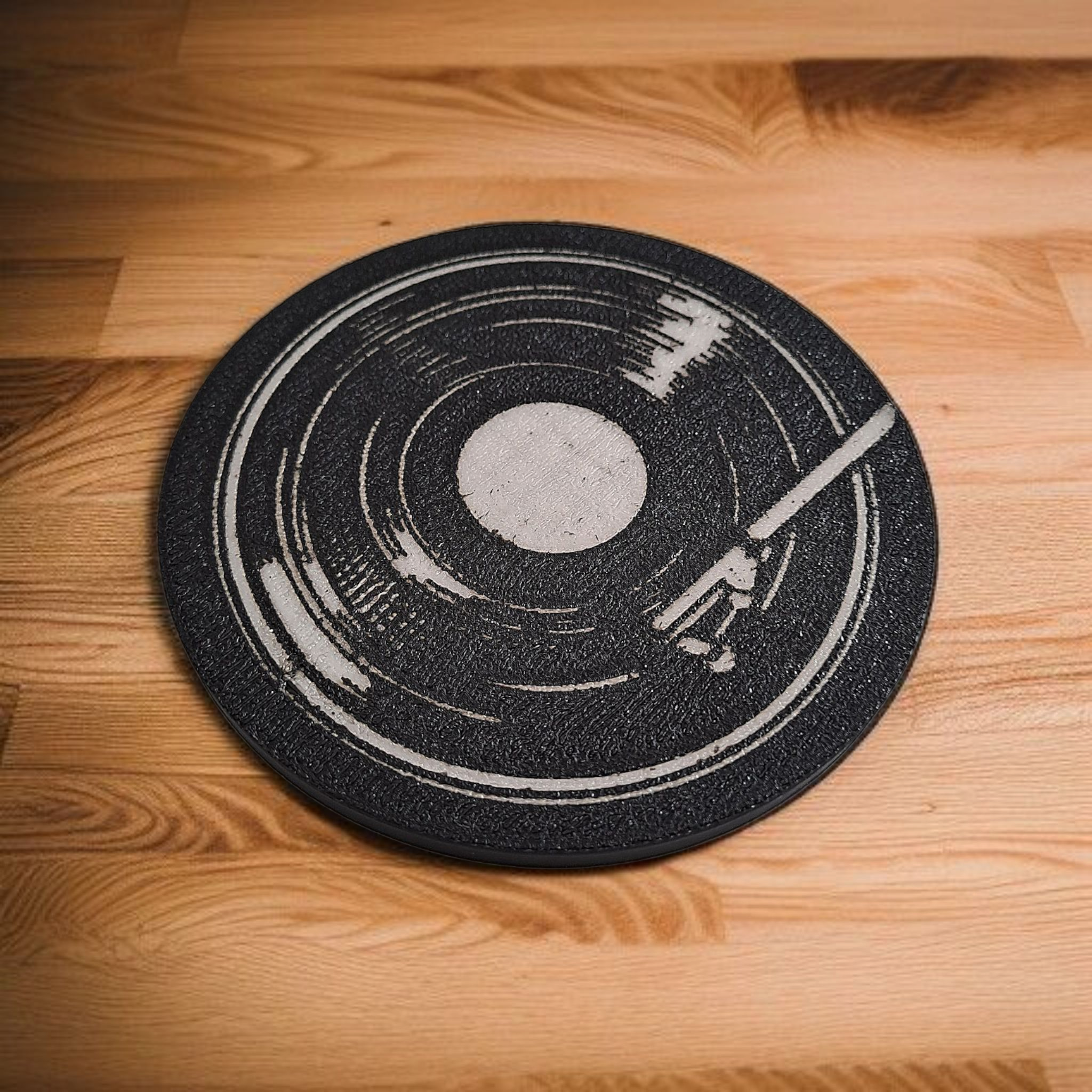 Close-up of 3D printed details on a retro vinyl coaster