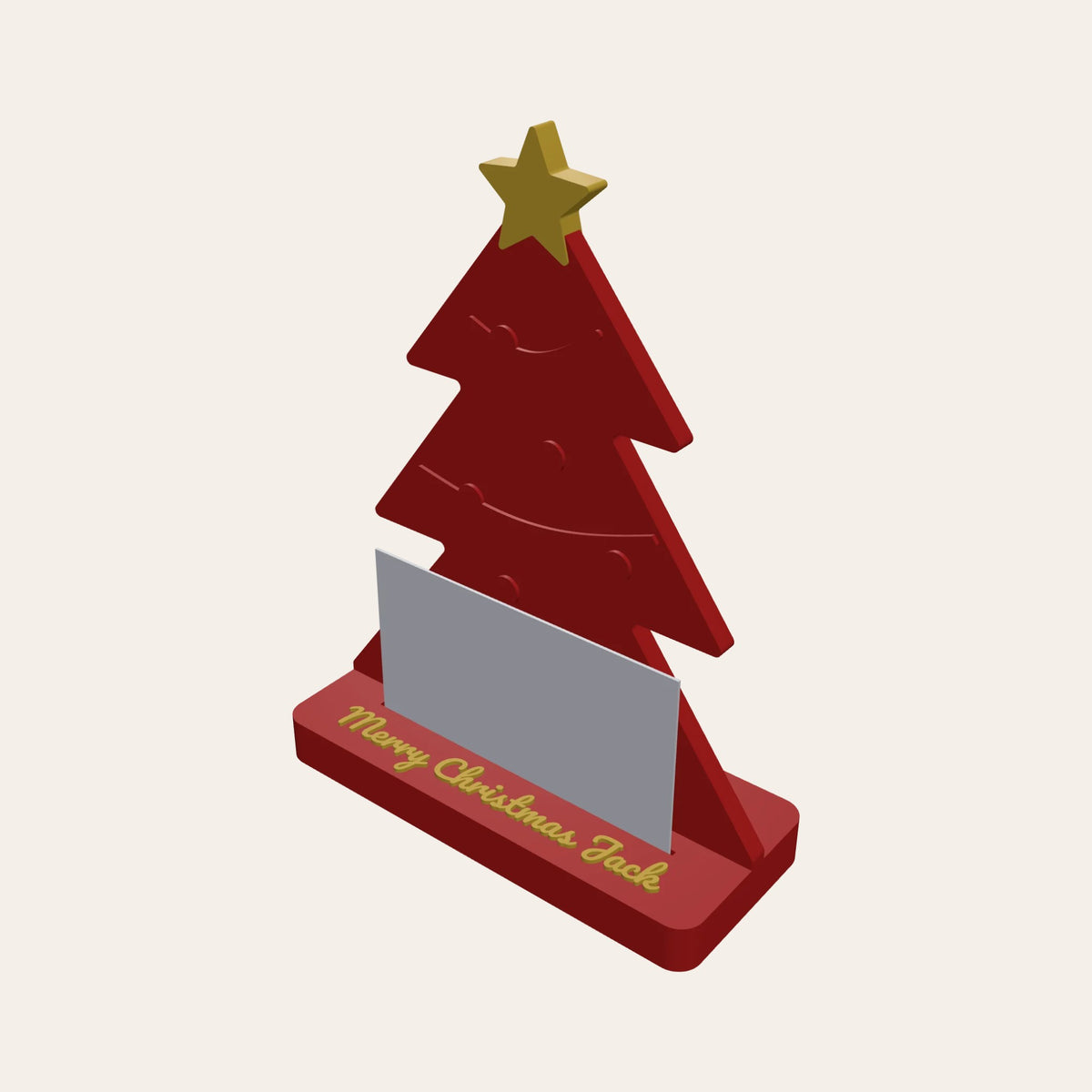 Christmas tree gift card holder in red and gold, a card in the slot and a name on the base