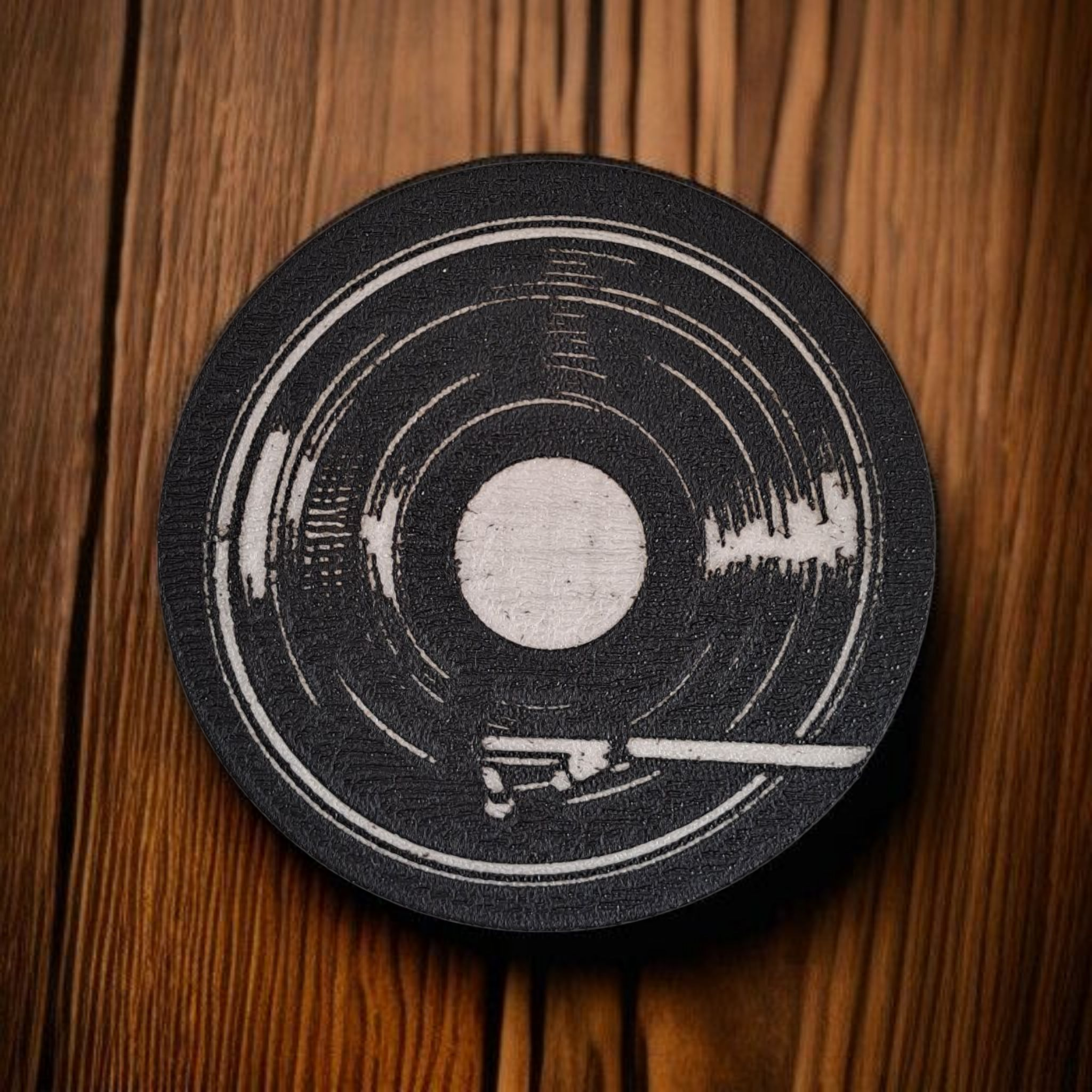 Retro vinyl record coaster for drinks on a wooden table
