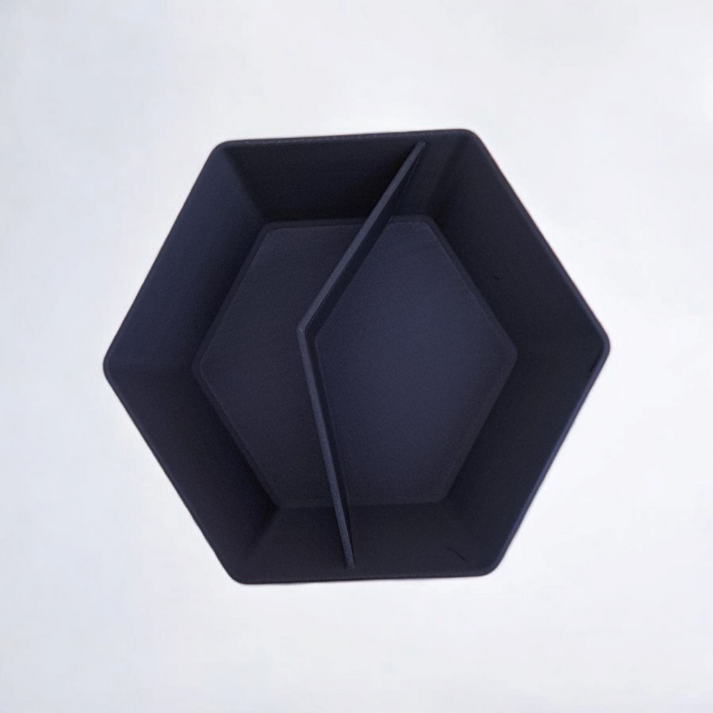 Black geometric bowl on a white background